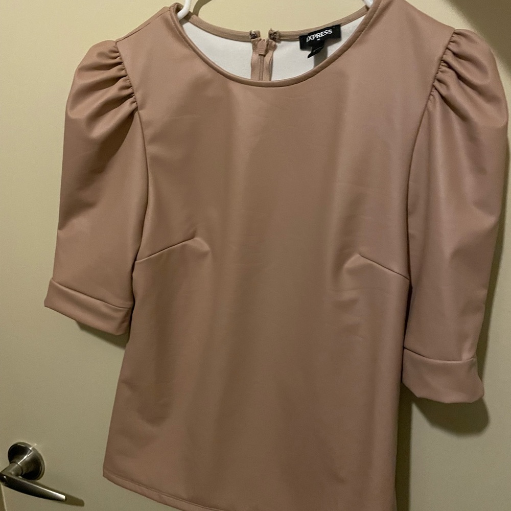 Tan “pleather” top with puffy sleeves. Leather look is in now! Worn once!